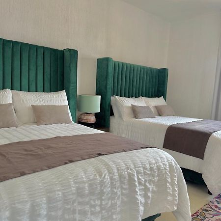 Suite Los Angeles テコサウトラ エクステリア 写真