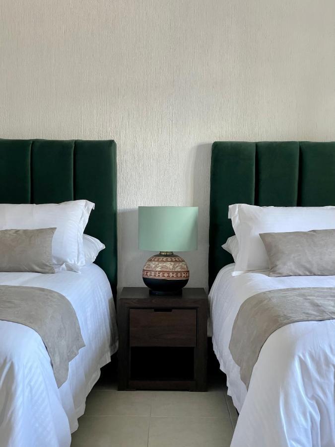 Suite Los Angeles テコサウトラ エクステリア 写真