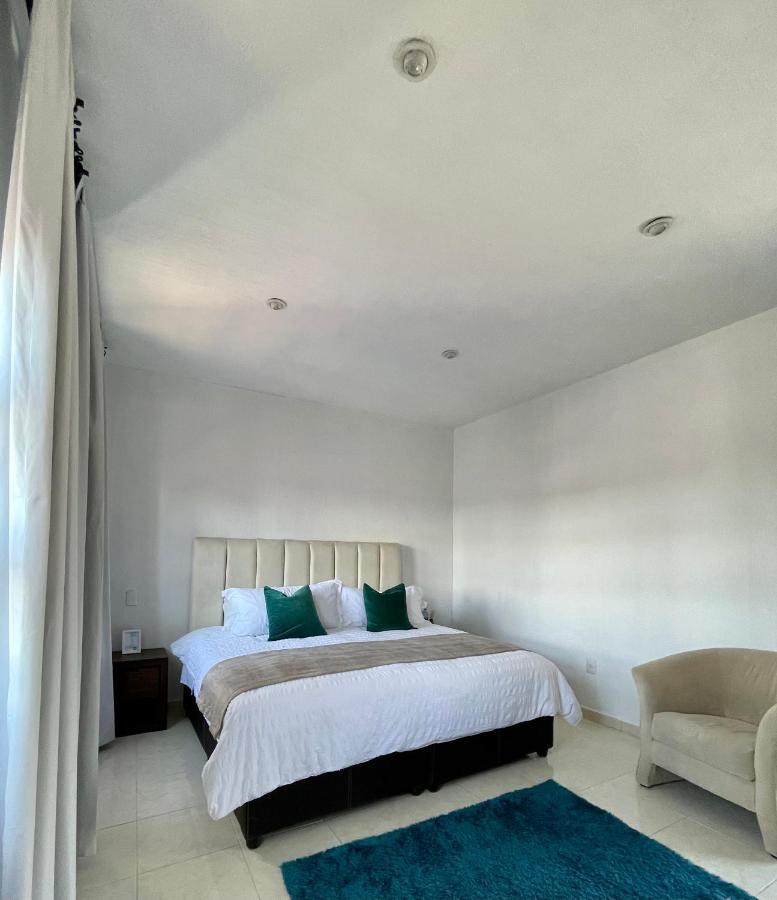 Suite Los Angeles テコサウトラ エクステリア 写真