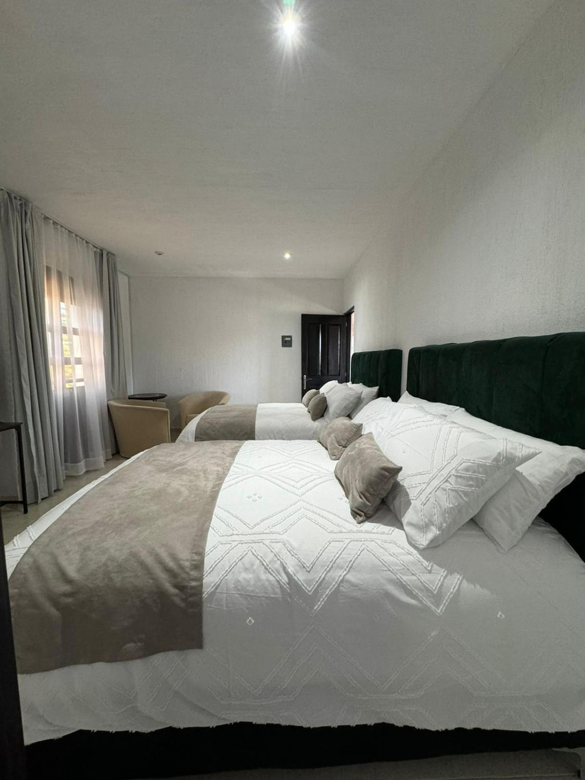Suite Los Angeles テコサウトラ エクステリア 写真